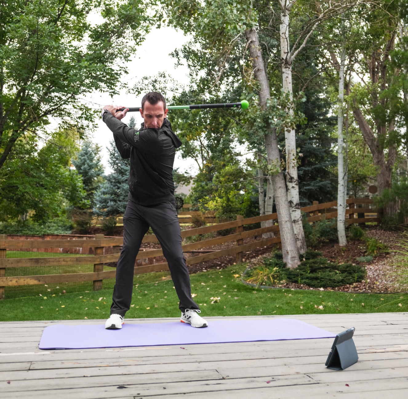 Man practicing golf swing